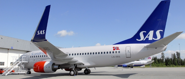 Am Boden: Der skandinavischen Airline SAS droht wegen neuer IFRS-Bilanzierungsvorschriften für Pensionsverpflichtungen eine finanzielle Schieflage.